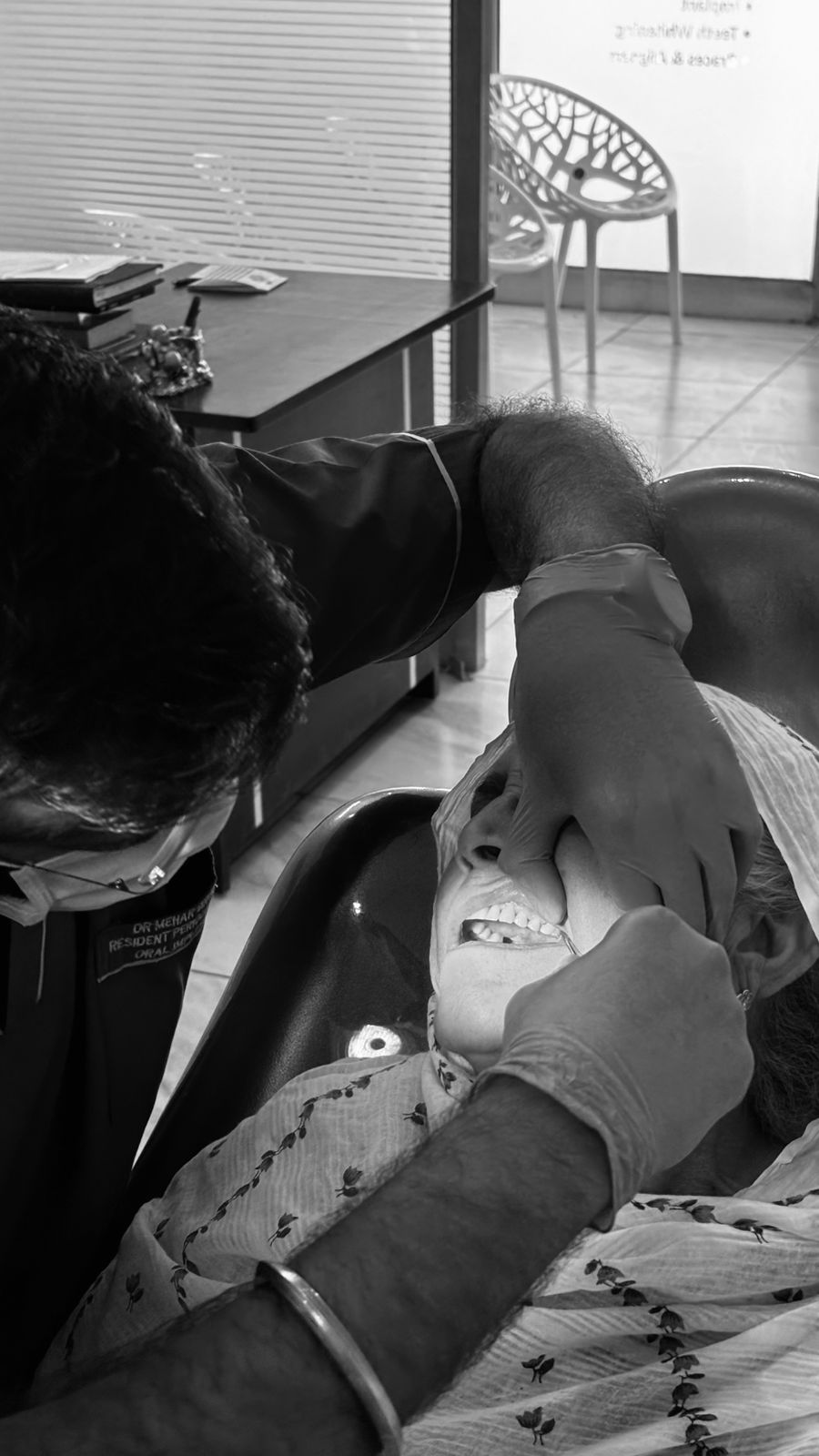 Dr. Mehar Singh Malhi treating a patient