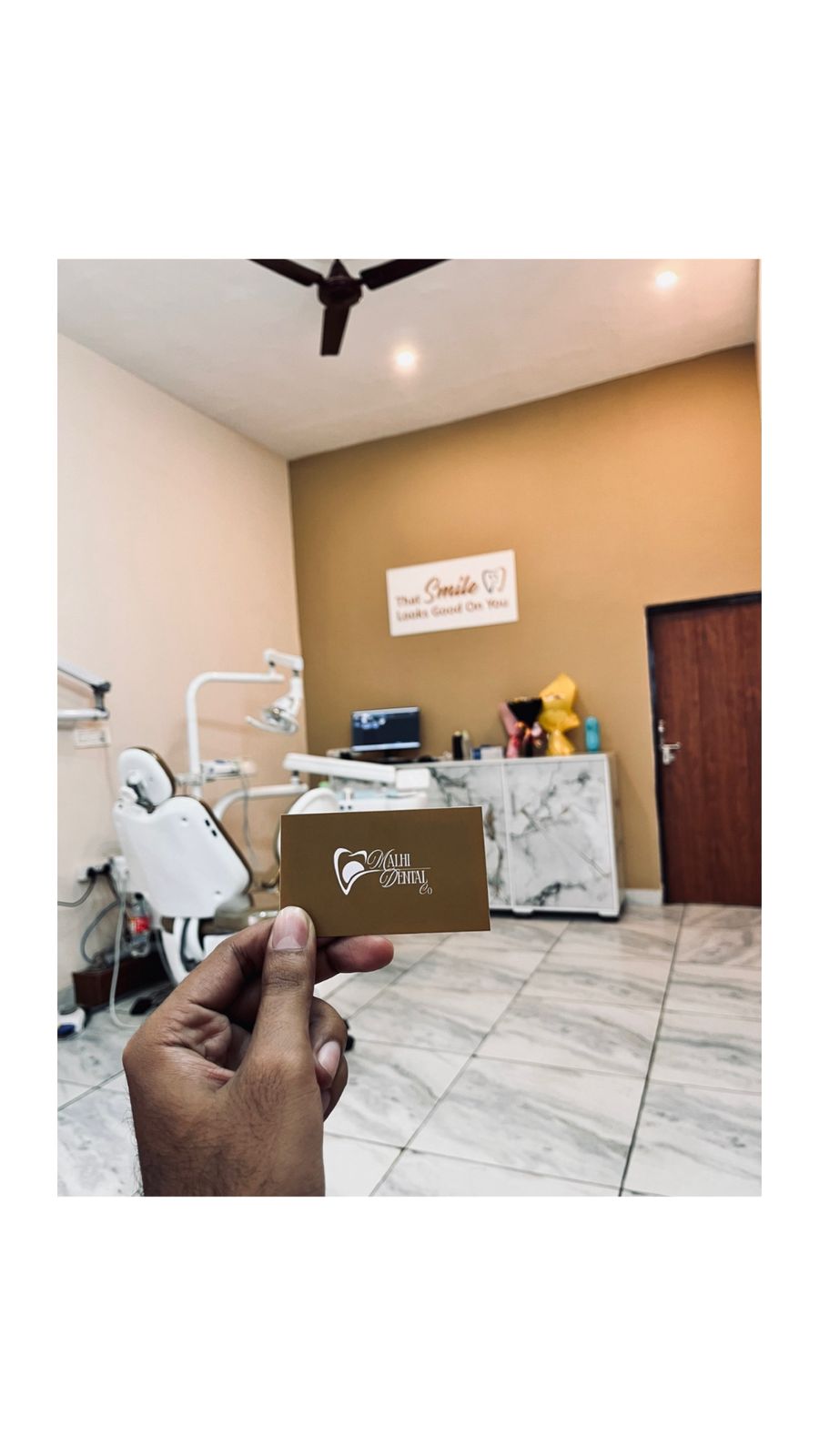 The Malhi Dental Co. card inside the clinic